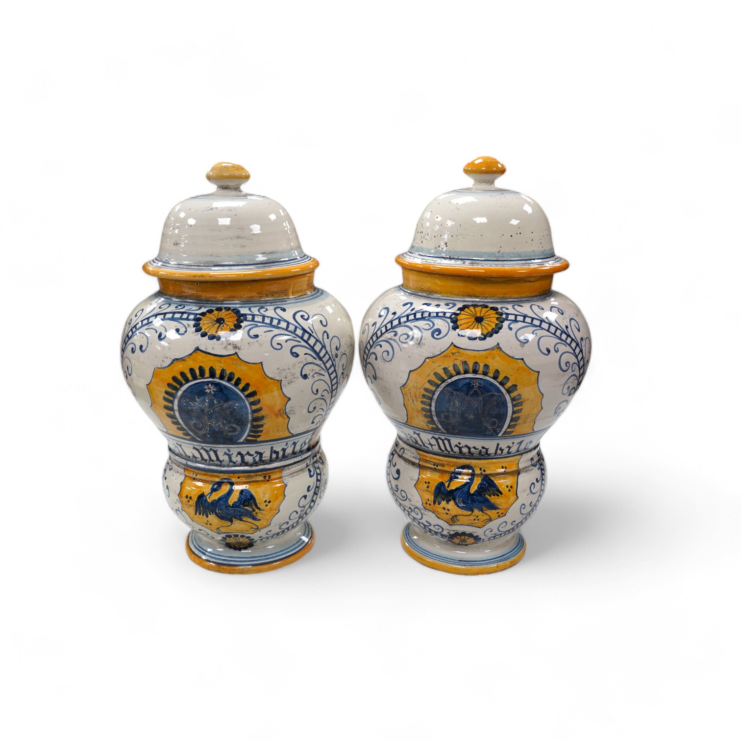 A pair of 17th century style maiolica drug jars and covers, 34cm. Condition - good